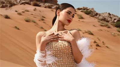 روان بن حسين تتألق بإطلالة فخمة في دبي تناغم رائع بين جمال الصحراء والموضة
